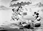Still from 'The Beach Party' featuring Clarabella Cow and Minnie Mouse picknicking on the beach